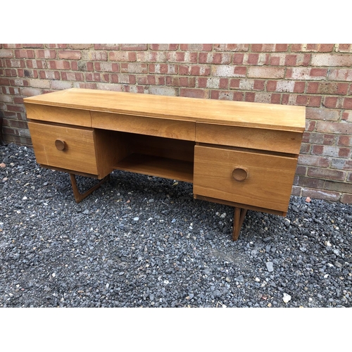 2 - A 1970's teak writing desk with five drawers 152x46x67