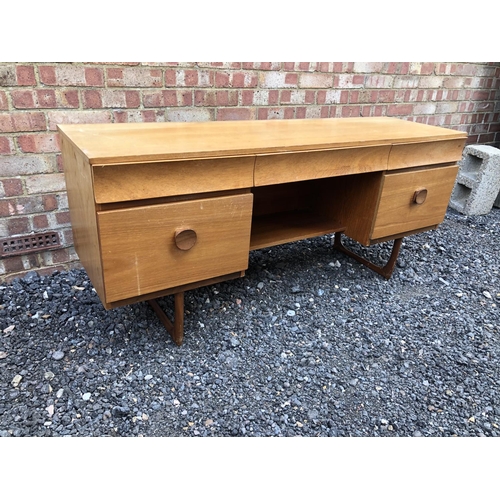 2 - A 1970's teak writing desk with five drawers 152x46x67