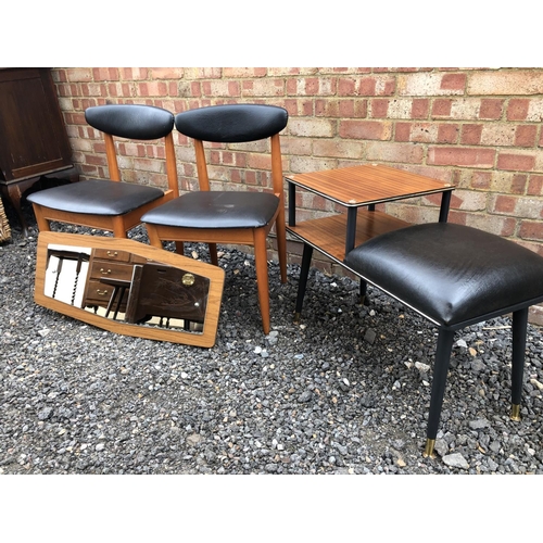 20 - A 1970's telephone table, together with a pair of teak chairs and a wall mirror