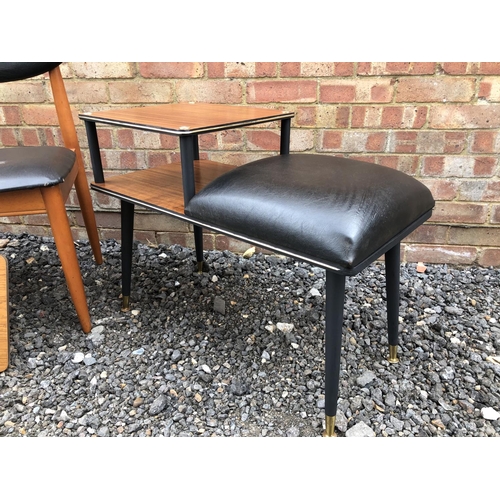 20 - A 1970's telephone table, together with a pair of teak chairs and a wall mirror