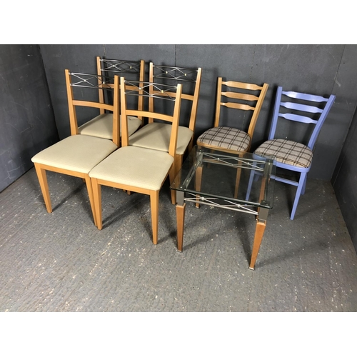 212 - A set of four modern chairs, together with a modern coffee table and two other kitchen chairs