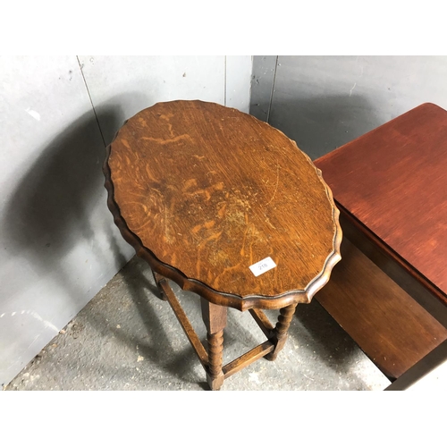 218 - An oval oak barley Twist occasional table together with a trolley