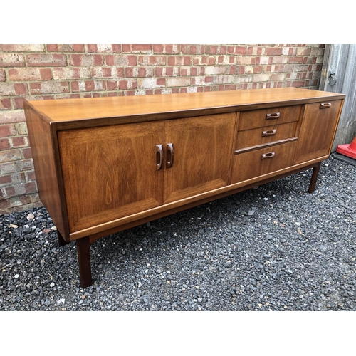 22 - A g Plan teak sideboard two doors, three drawers and cocktail compartments 205x46x81