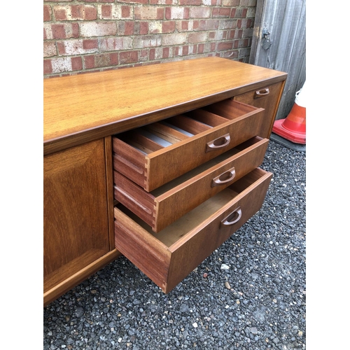 22 - A g Plan teak sideboard two doors, three drawers and cocktail compartments 205x46x81