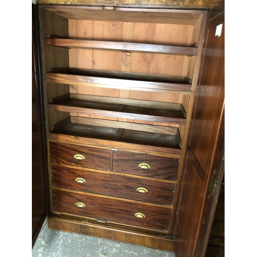 228 - A Victorian walnut triple compactum wardrobe with linen press, draws and hanging compartments 174x50... 