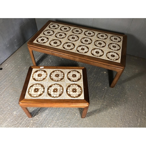 244 - A pair of g plan teak tile top coffee tables, one larger one smaller