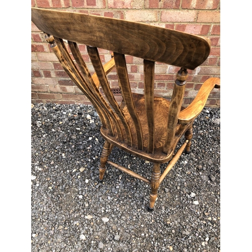 259 - A country windsor carver chair