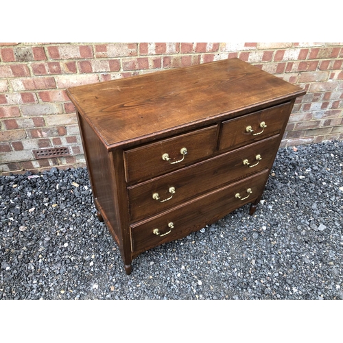 26 - An oak chest of four drawers with brass drop handles 90x45x82