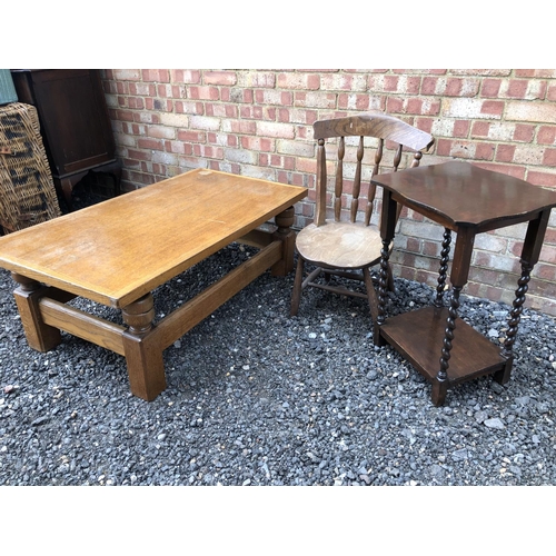 27 - A large oak coffee table together with a Windsor chair and an oak barley Twist occasional table