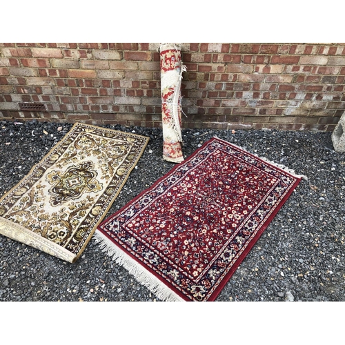 31 - Three small Patterned rug s