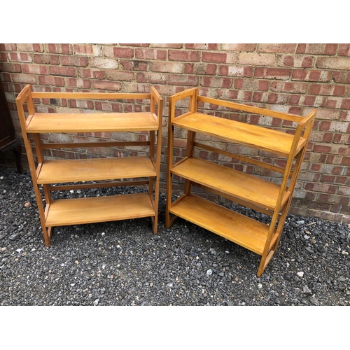 43 - A pair of modern pine folding bookcases