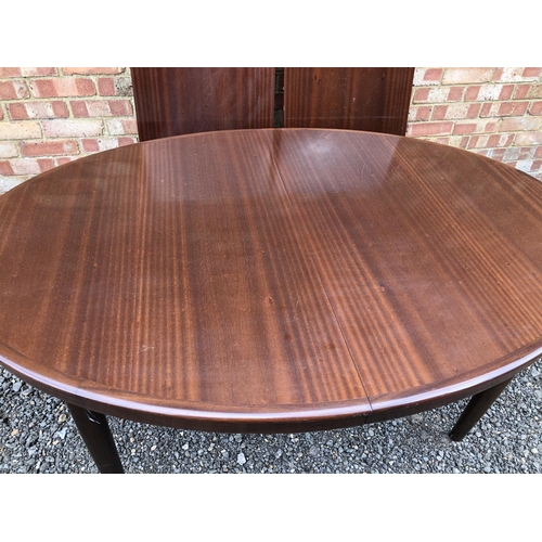 44 - A Danish oval extending table by Bramin. With two extension leaves 116x166 ( table closed)