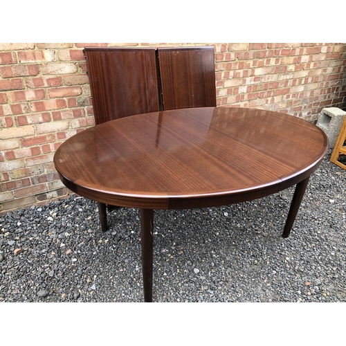 44 - A Danish oval extending table by Bramin. With two extension leaves 116x166 ( table closed)