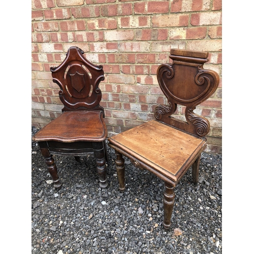 45 - Two mahogany  hall chairs