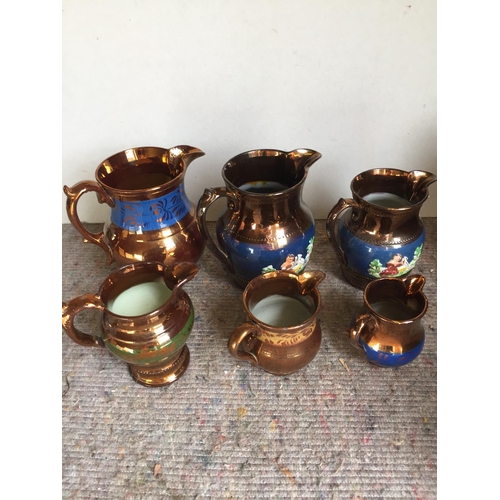 474 - Six lustre jugs