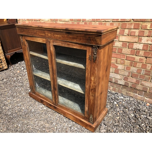 6 - A Victorian mahogany two door pier cabinet with inlaid front and brass mounts 108x101x32