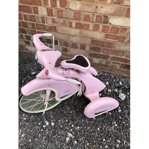 63 - A vintage style pink pedal toy