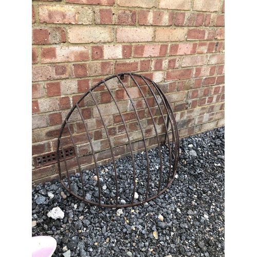 64 - A vintage metal hay rack