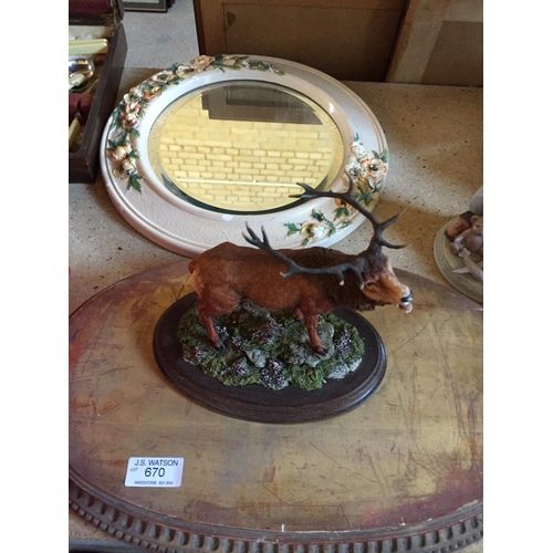 670 - Giltwood base, stag figure and plaster mirror