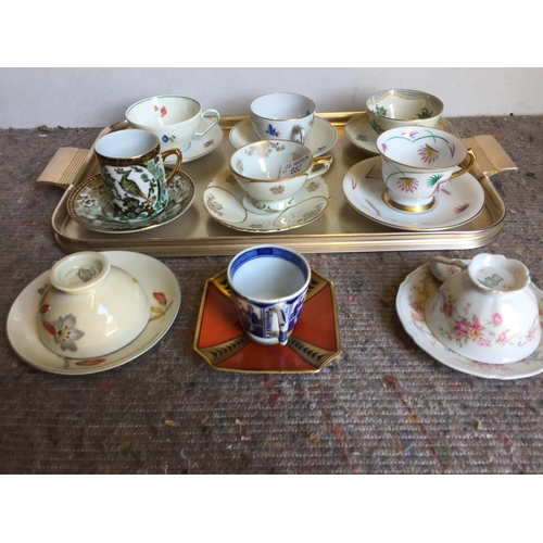 682 - Collection of nine cabinet cups and saucers