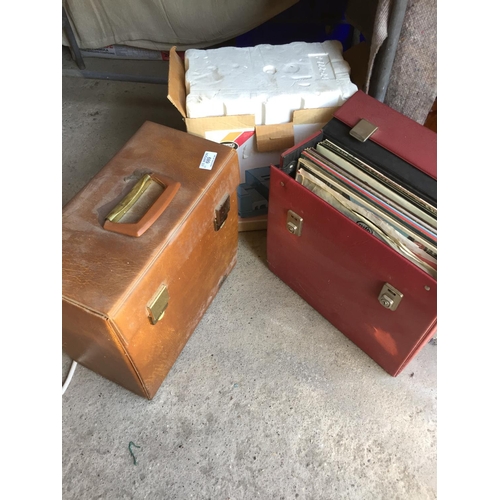 689 - Two cases of LP records and slide projector