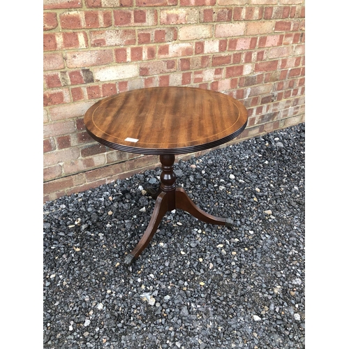 69 - A reproduction mahogany occasional table