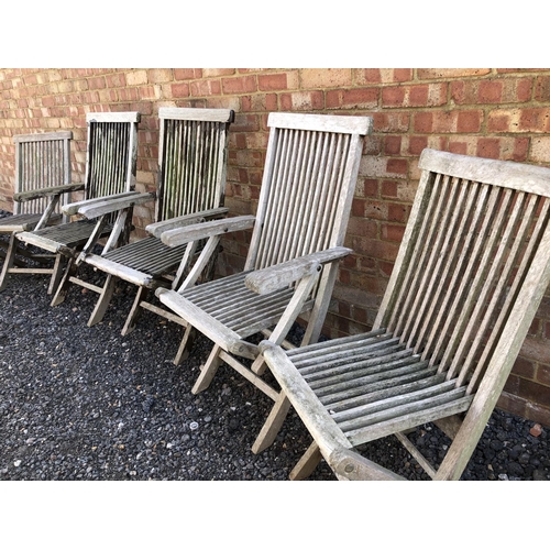 77 - Six folding hardwood garden chairs