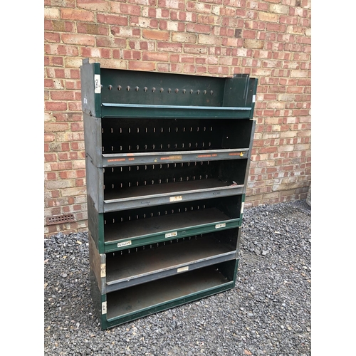 8 - A green metal six section stacking shelving system 90x30x140