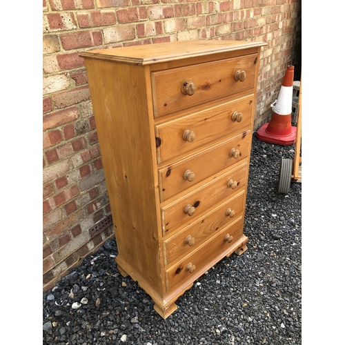 91 - A pine tallboy chest of six drawers 65x40x113