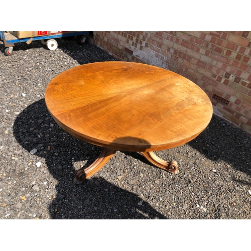 62 - A large circular walnut Loo table stamped for the maker Holland and sons 124cm diameter