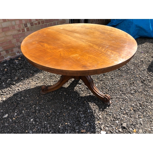 62 - A large circular walnut Loo table stamped for the maker Holland and sons 124cm diameter