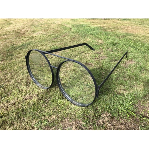 1 - A pair of ironwork oversize spectacles, hand made from iron with mirror lenses. Garden ornament. 140... 