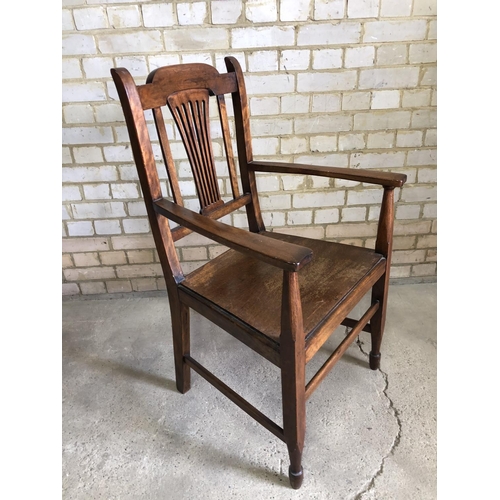 100 - )A single carver chair