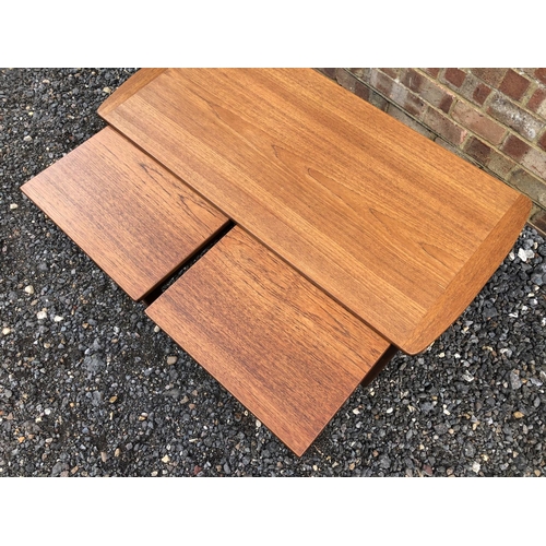 104 - A teak nest of three tables