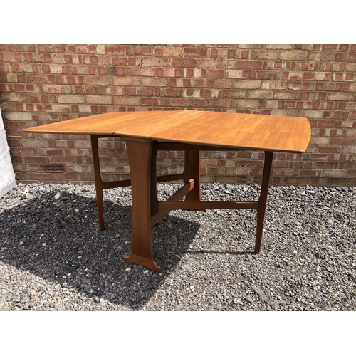 110 - A teak drop leaf table by legate furniture