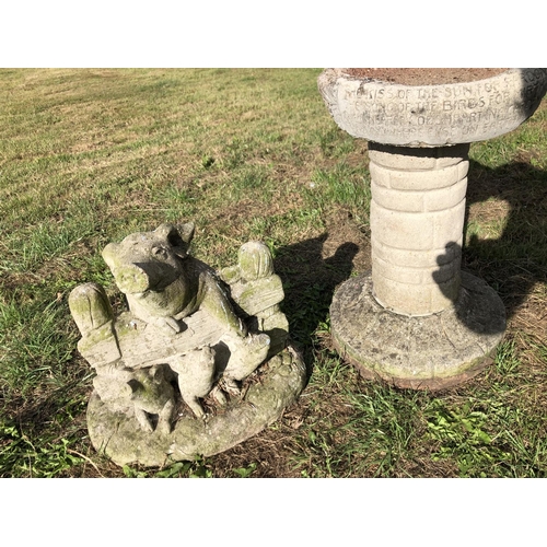 12 - A concrete pig figure together with a concrete bird bath