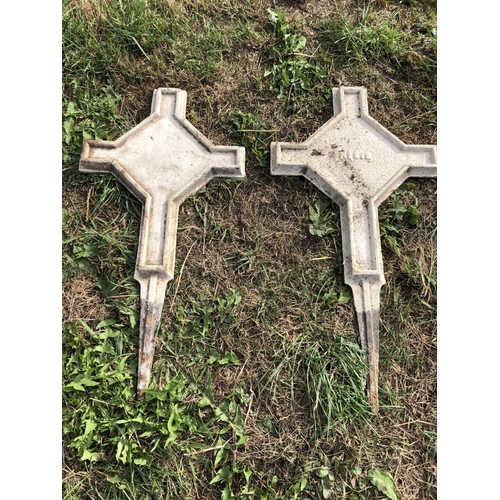 15 - A pair of cast metal grave marking points in the form of crosses 54cm High