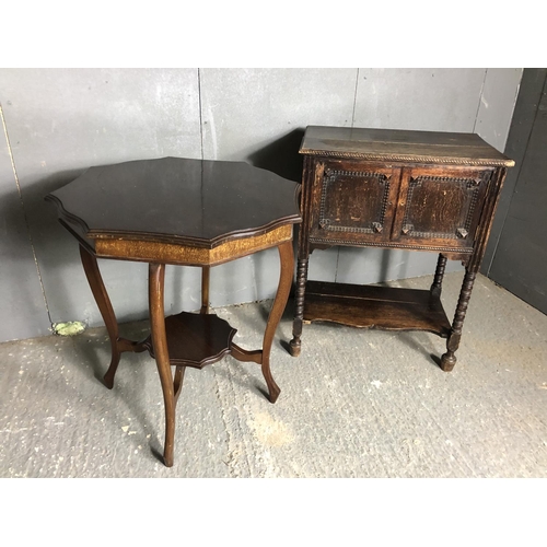 26 - An oak two door cupbaord together with an octagonal mahogany occasional table