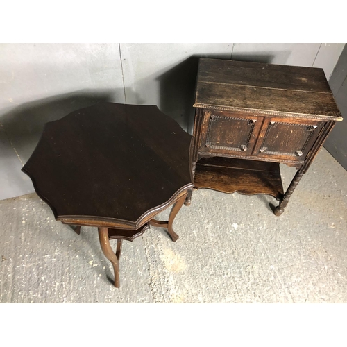 26 - An oak two door cupbaord together with an octagonal mahogany occasional table