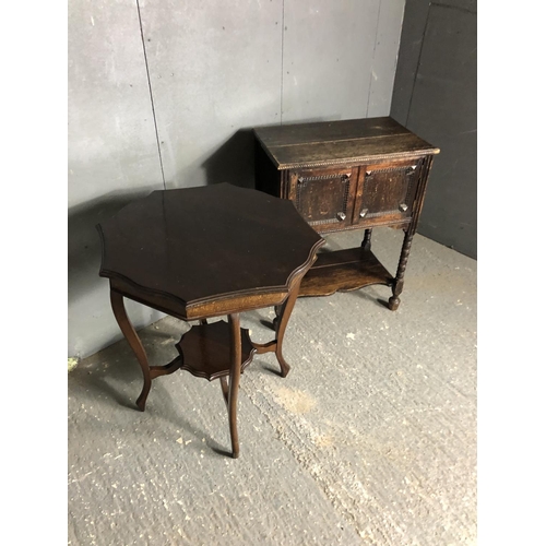 26 - An oak two door cupbaord together with an octagonal mahogany occasional table