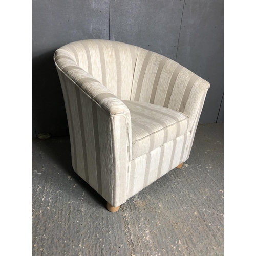 27 - A modern tub chair with striped upholstery