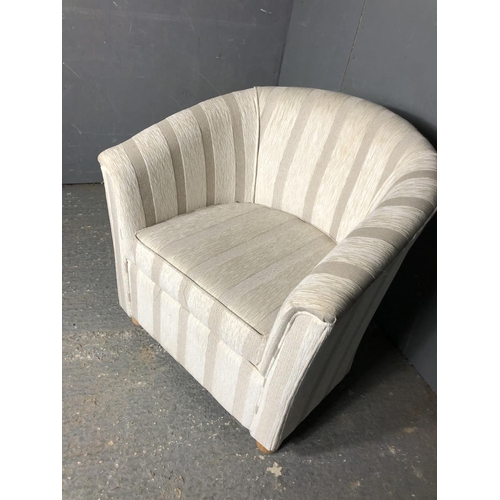 27 - A modern tub chair with striped upholstery