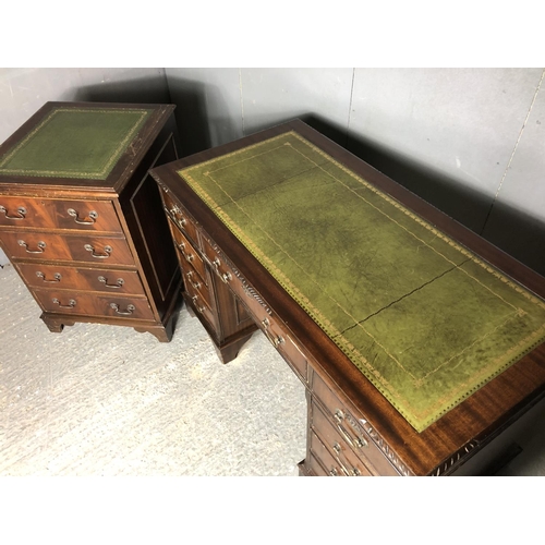 29 - A reproduction Mahoney pedestal desk together with a matching two drawer filing cabinet