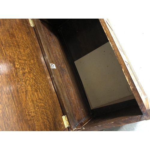 46 - A small oak linenfold blanket box