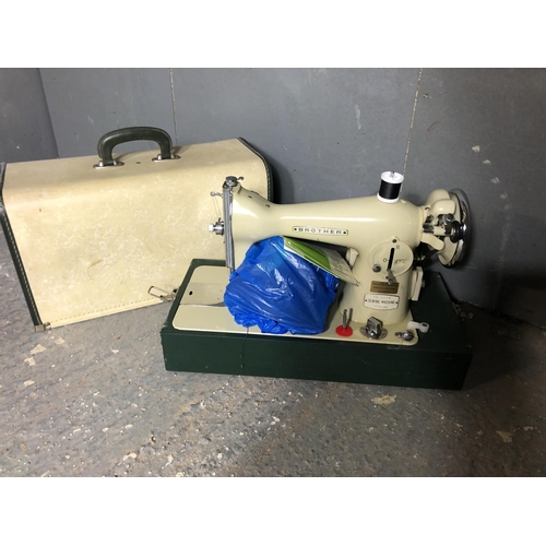 59 - A cased brother sewing machine