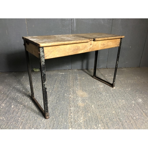 63 - A double school desk with lift up tops