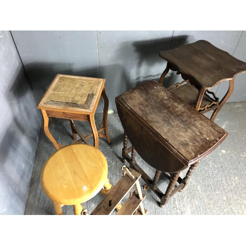 69 - An oak gateleg table together with two occasional tables, pine stool and wall shelf