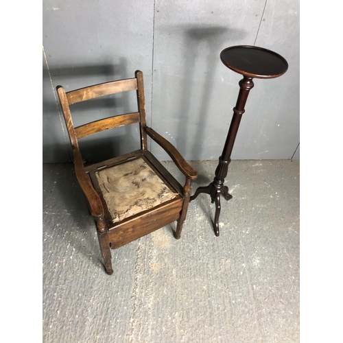 74 - A Mahogany commode together with a tochere plant stand