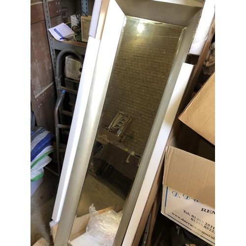 754 - A large silver framed dressing mirror 48x182