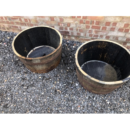 90 - A pair of half barrel garden planters